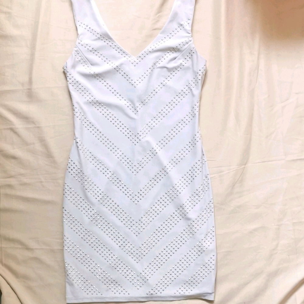 White dress with golden sequence